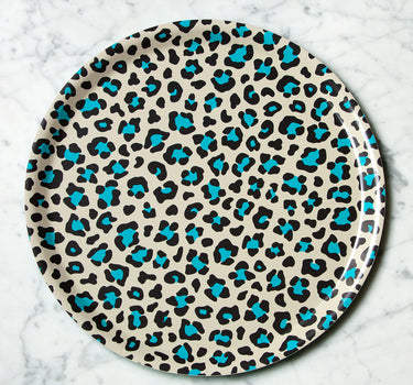 Leopard tray turquoise background 